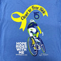 Blue shirt with "closer to free ride" and a cycling logo