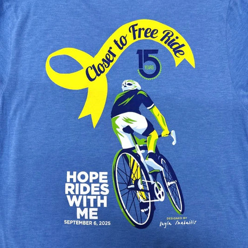 Blue shirt with "closer to free ride" and a cycling logo